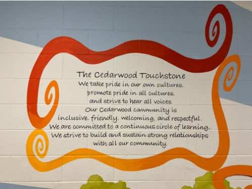 The words of the Cedarwood Touchstone painted on a school wall